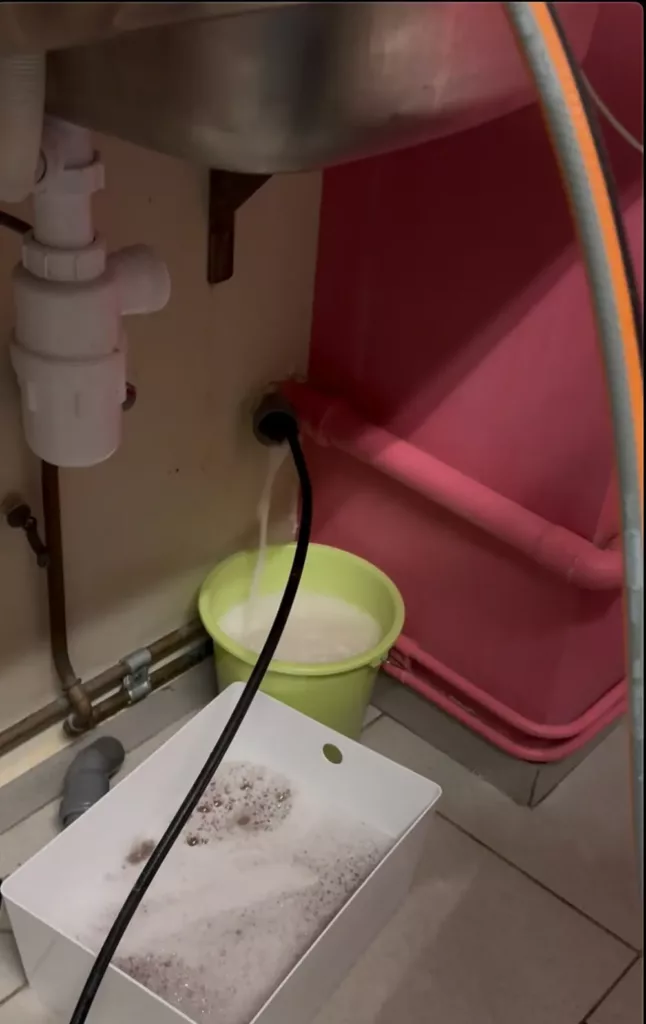 Débouchage d'un siphon avec récupération des eaux à Ganshoren