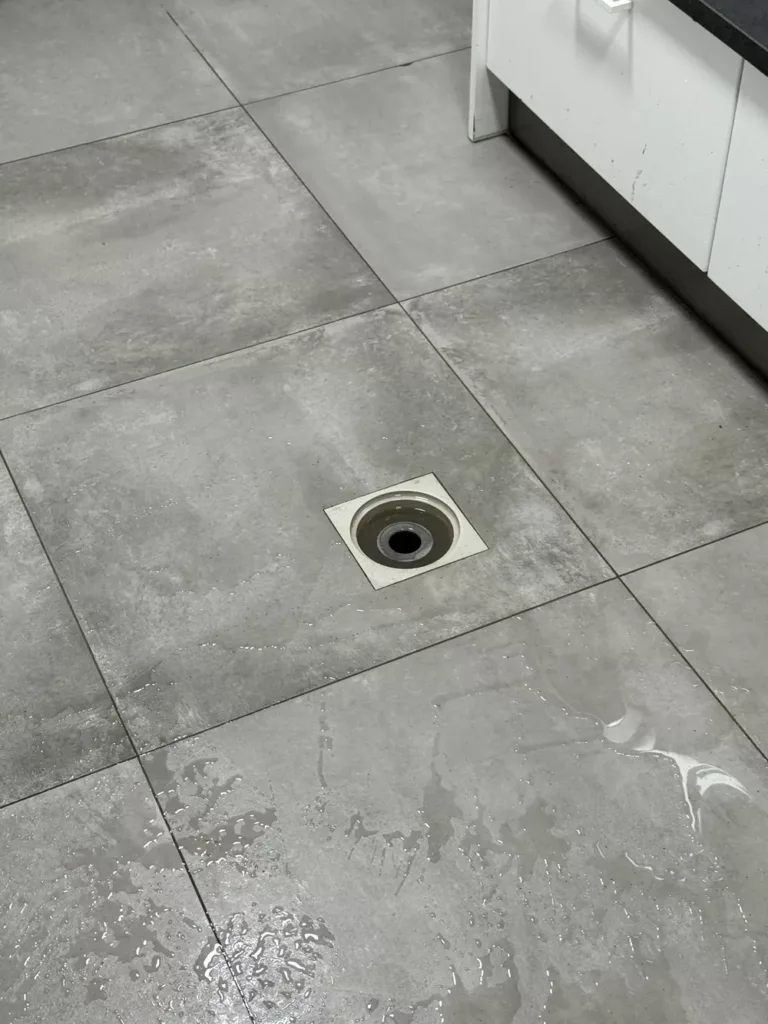 Siphon de sol dans une buanderie à Uccle