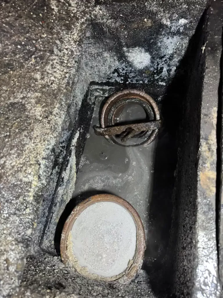 Tampon de visite sur une canalisation à Uccle